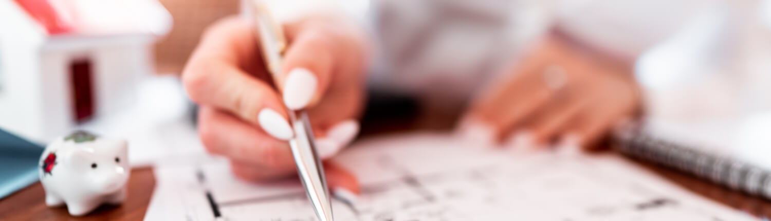 A person writing a weird insurance claim