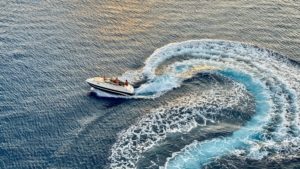 An aerial view of a boat on the water